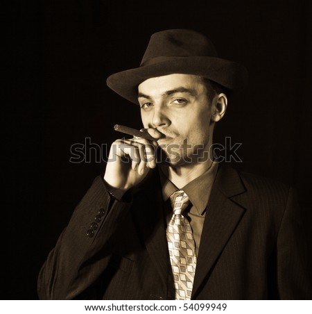 Old Style Photo Of Man In Suit With Cigar - 54099949 : Shutterstock