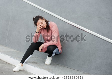 Similar – Image, Stock Photo Attractive female runner taking break after jogging outdoors