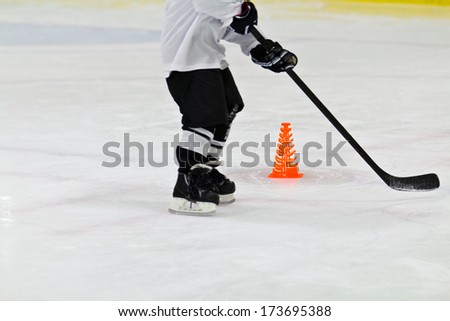 Child at ice hockey practice