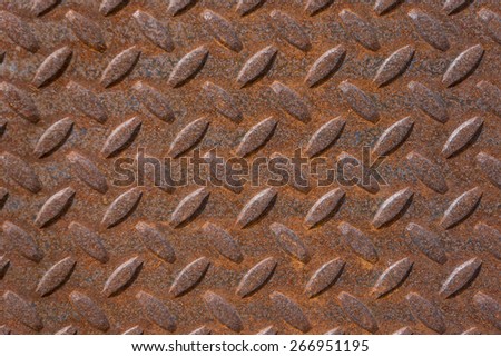 Rusty steel surface with anti slip pattern
