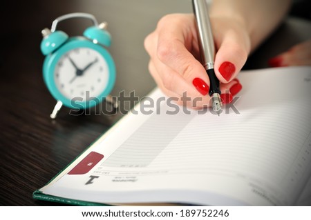 fountain pen writing on a blank diary