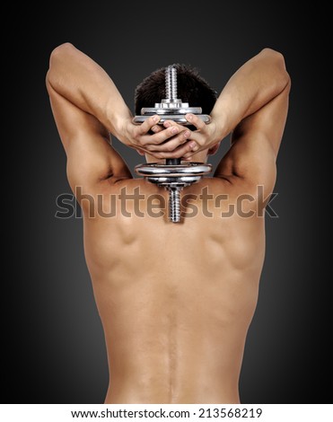 muscular guy holding a dumbbell behind your back