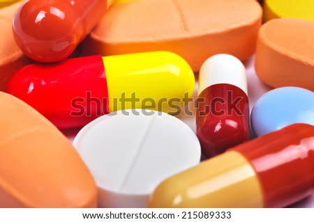 Colored tablets,  pills and capsules, close up