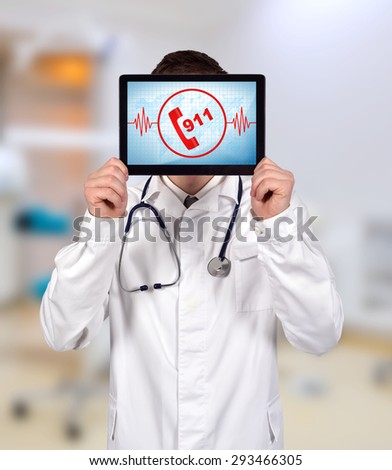 doctor holding touch pad with 911 symbol