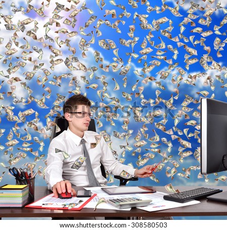 businessman sitting in office and falling dollars banknote on sky background