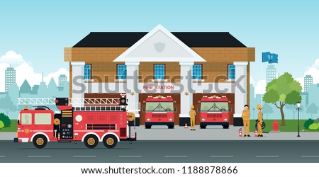 Staff and fire trucks are in front of the station. Stockfoto © 