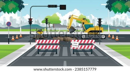 Workers are using an excavator to repair the road at a traffic light intersection.