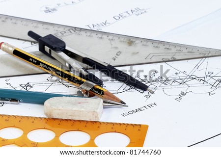 closeup of drafting tools on engineering plan