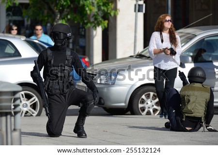 Club of stuntmen shows to people of the city a simulation of training of police special forces in Vilagarcia de Arousa, Galicia, Spain. June 16, 2014.