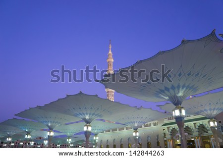 Canopies of Masjid Al Nabawi (Mosque of the Prophet) at sunrise in Medina (City of Lights), Saudi Arabia.Nabawi mosque is Islam's second holiest mosque after Haram Mosque (in Mecca, Saudi Arabia)