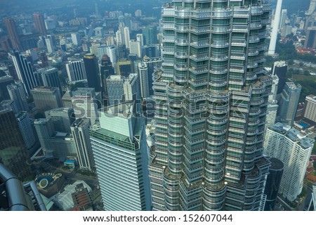 KUALA LUMPUR, MALAYSIA-AUG.19:A general view of tallest twin towers in the world PETRONAS TWIN TOWERS and its surrounding area in Kuala Lumpur, Malaysia on August 19, 2013.
