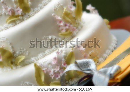 wedding cake and a cutting knife