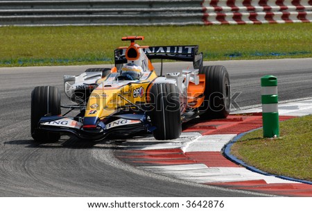 Giancarlo Fisichella lifts the tyre while negotiating a turn at Sepang F1 Malaysia 2007 Grand Prix