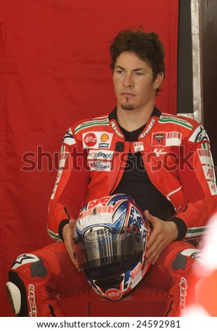 SEPANG, MALAYSIA -  FEBRUARY 5: American Nicky Hayden of Ducati Marlboro Team in deep thought at MotoGP Official Test at Sepang, Malaysia on February 5, 2009.