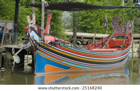 Colorful pattern of traditional fisherman boats in Kelantan, Malaysia. These wooden boats were made and painted by boat makers in south of Thailand.