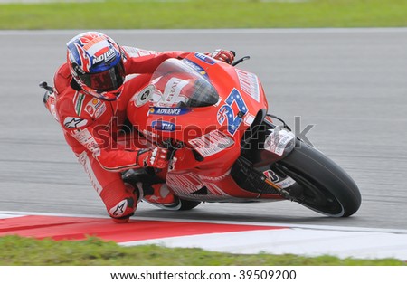 SEPANG, MALAYSIA - OCT 24 : Australian Casey Stoner of Ducati Marlboro Team takes a corner during qualifying session at Shell Advance Malaysian Motorcycle Grand Prix on October 24, 2009 in Sepang.
