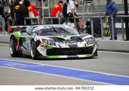 SEPANG, MALAYSIA-SEPT 16:Craft Euroasia Racing Hong Kong driver in Ford GT3 car ready for pitstop at GT Class qualifying of Malaysia Merdeka Endurance Race (MMER) in Sepang, Malaysia on 16, 2011