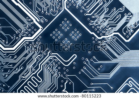 Abstract blue computer circuit board close up for background.
