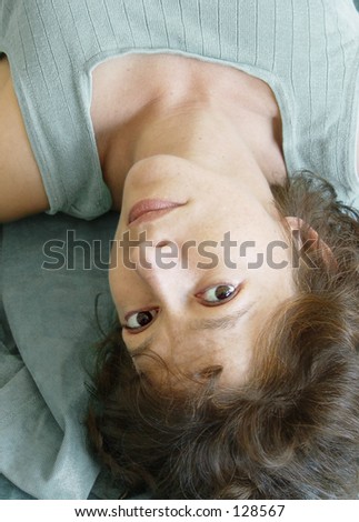 Beautiful woman lying upside down