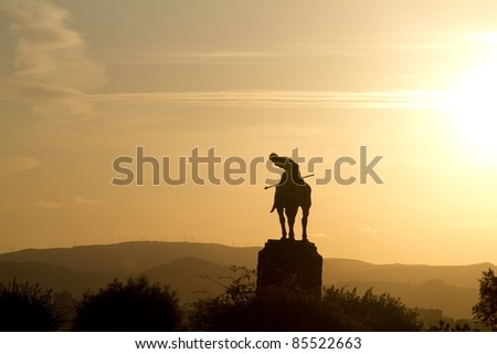 Polo player sunset