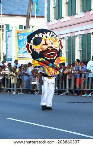 NASSAU, THE BAHAMAS - July 6 - Dancing man in pirate costume, performs in a traditional island cultural festival in Nassau, July 6, 2014