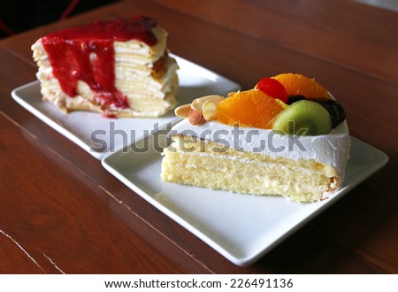 Mixed tropical fruit cake with white cream