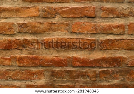 Background or texture of brick wall in earth tones