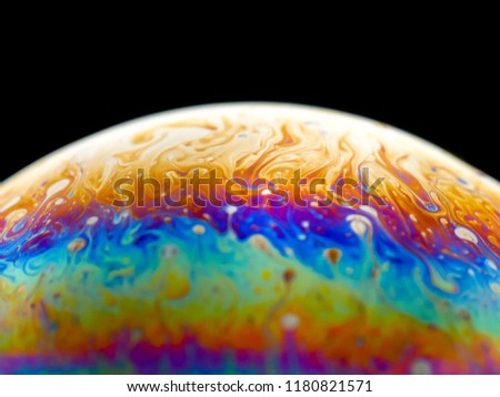 Similar – Image, Stock Photo The half soap bubble is reflected in the wet surface and in this way forms a whole again.