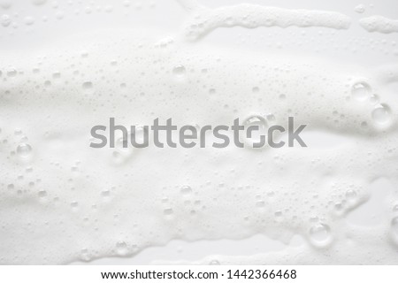 Abstract background white soapy foam texture. Shampoo foam with bubbles Foto stock © 