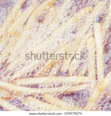 French fries in oil old vintage retro style