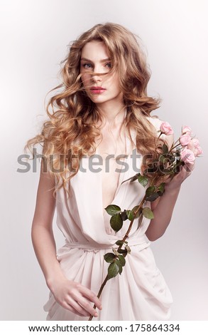 Fashion model with flowers , spring look,