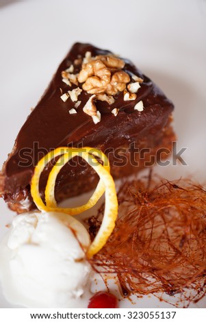 Dark chocolate cake. Holiday dessert. Nuts.