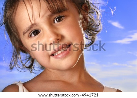 Close-up of girl against late summer sky