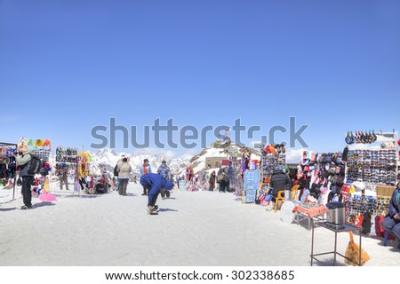 DOMBAY, RUSSIA - May 03.2015: Little tourist accessories market and cafe on the first level of getting up on the mountain Mussa-Achitara