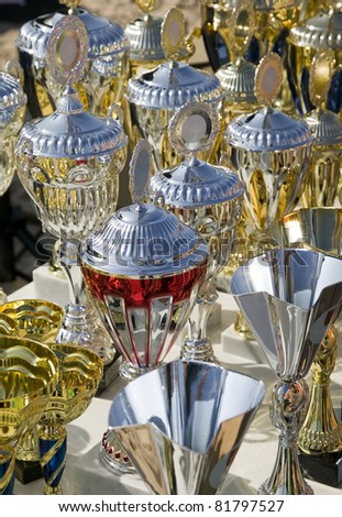 Background made from many champion trophy cups, golden color