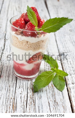 strawberry desert in a glass, strawberry with mint, fresh strawberry dessert