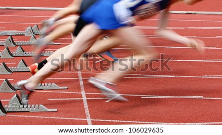 sprint start in track and field in blurred motion
