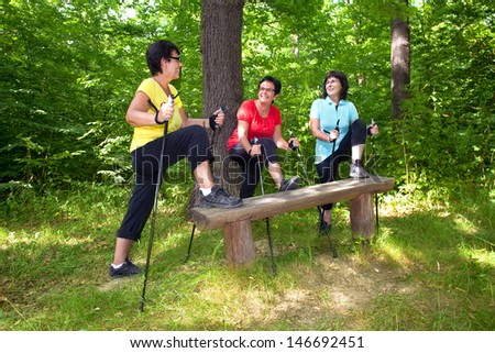 mature woman Group while athletic exercises to warm up for training