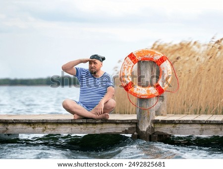 Similar – Foto Bild Rettungsring auf Steg an Anlegestelle