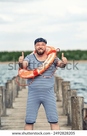 Similar – Foto Bild Rettungsring auf Steg an Anlegestelle