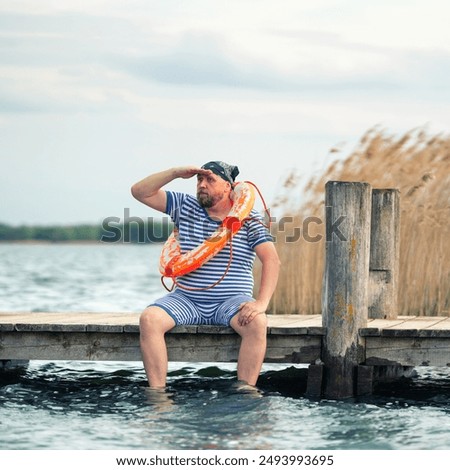 Similar – Foto Bild Rettungsring auf Steg an Anlegestelle