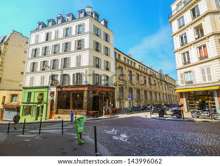 PARIS, FRANCE - MAY 3: The streets in Paris are full of art galleries, cafes and shops to walk about. It\'s one of the most visited landmarks in Paris. May 3, 2011 in Paris, France