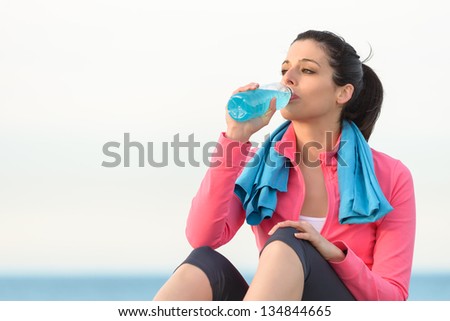 Similar – Image, Stock Photo Woman drinking isotonic drink while resting