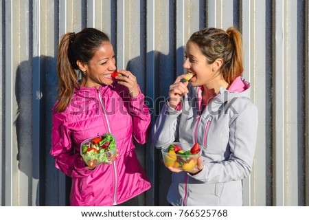 Similar – Foto Bild Fröhliche ethnische Sportlerin beim Headset-Training am Stadtfluss