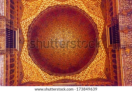 SEVILLE, SPAIN - OCTOBER 21, 2012 Circle Mosaic Ceiling in Ambassador Room Alcazar Royal Palace Seville Andalusia Spain on October 21, 2012.  Originally  Moorish Fort oldest Royal Palace in Europe.