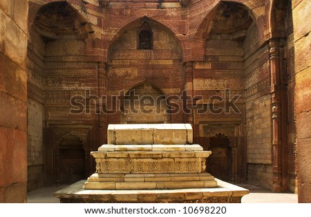 Iltumish Tomb surrounded by carved sandstone walls Qutab Minar, Delhi, India