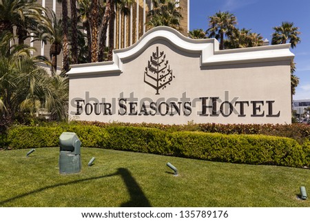 LAS VEGAS - APRIL 19: Four Seasons sign on April 19, 2013  in Las Vegas. The top 5 floors of Mandalay bay are occupied by the Four Seasons Hotel. The top 3 floors are penthouses.