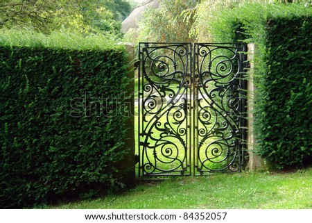 Image, Stock Photo old closed garden gate with wire mesh fence and hole