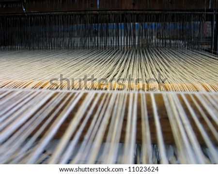Strings in a hand-loom - All strings attached - Textile abstract
