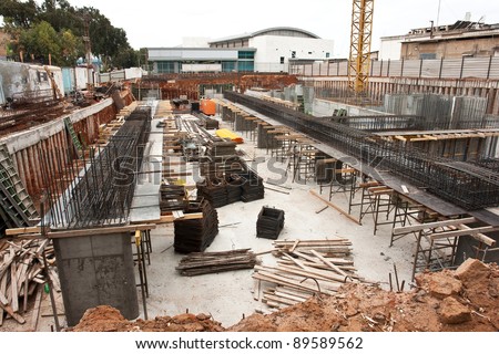 City urban construction site in early foundation building stage